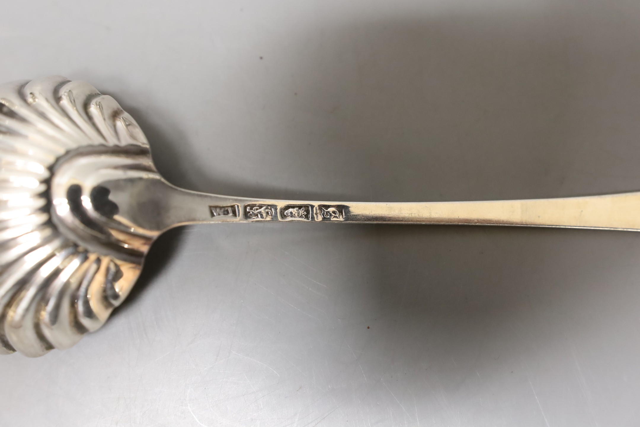 A set of four George III silver Old English pattern feather edge sauce ladles, London, 1771, 17.6cm, six other similar sauce ladles including two pairs and three Georgian silver sifter spoons